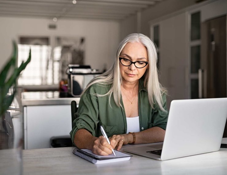 senior-fashionable-woman-working-at-home-PRY4EXQ.jpg